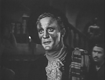 Sherlock Holmes disguised as a ghost (Ronald Howard)