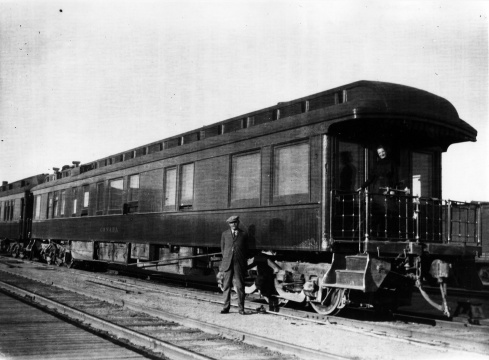 Arthur Conan Doyle in front of the Grand Trunk Railway's private car the "Canada".