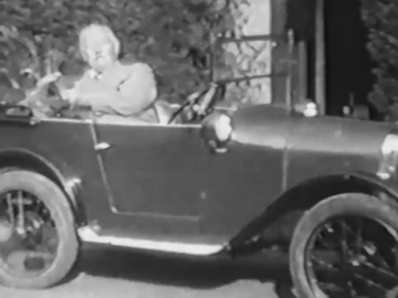 Arthur, Adrian and Denis Conan Doyle (1929-1930) Adrian in a car race, and Denis and Arthur Conan Doyle in a car with a dog.