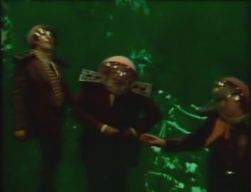 The 3 heroes underwater with diving suits