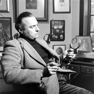 Adrian with pipe and magnifying glass (march 1948).