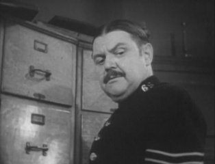 K. Richard Larke as Sergeant Wilkins in episode The Case of the Singing Violin (1955)