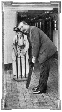 Sir Arthur Conan Doyle playing cricket on board the "Dunottar Castle". Lady Conan Doyle alternately played the part of wicket keeper and bowler on this occasion (september 1909).
