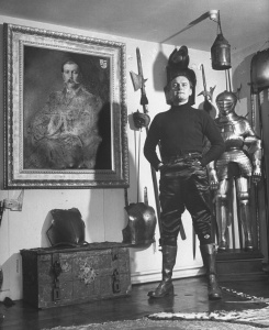 Adrian in front of his father's portrait (february 1948).